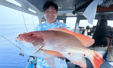 Bottom fishing at Tioman, Malaysia. Red snapper (ang kuay) caught using live fish bait.
