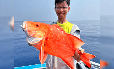Bottom fishing at Tioman, Malaysia. Red snapper (ang kuay) caught using live fish bait.